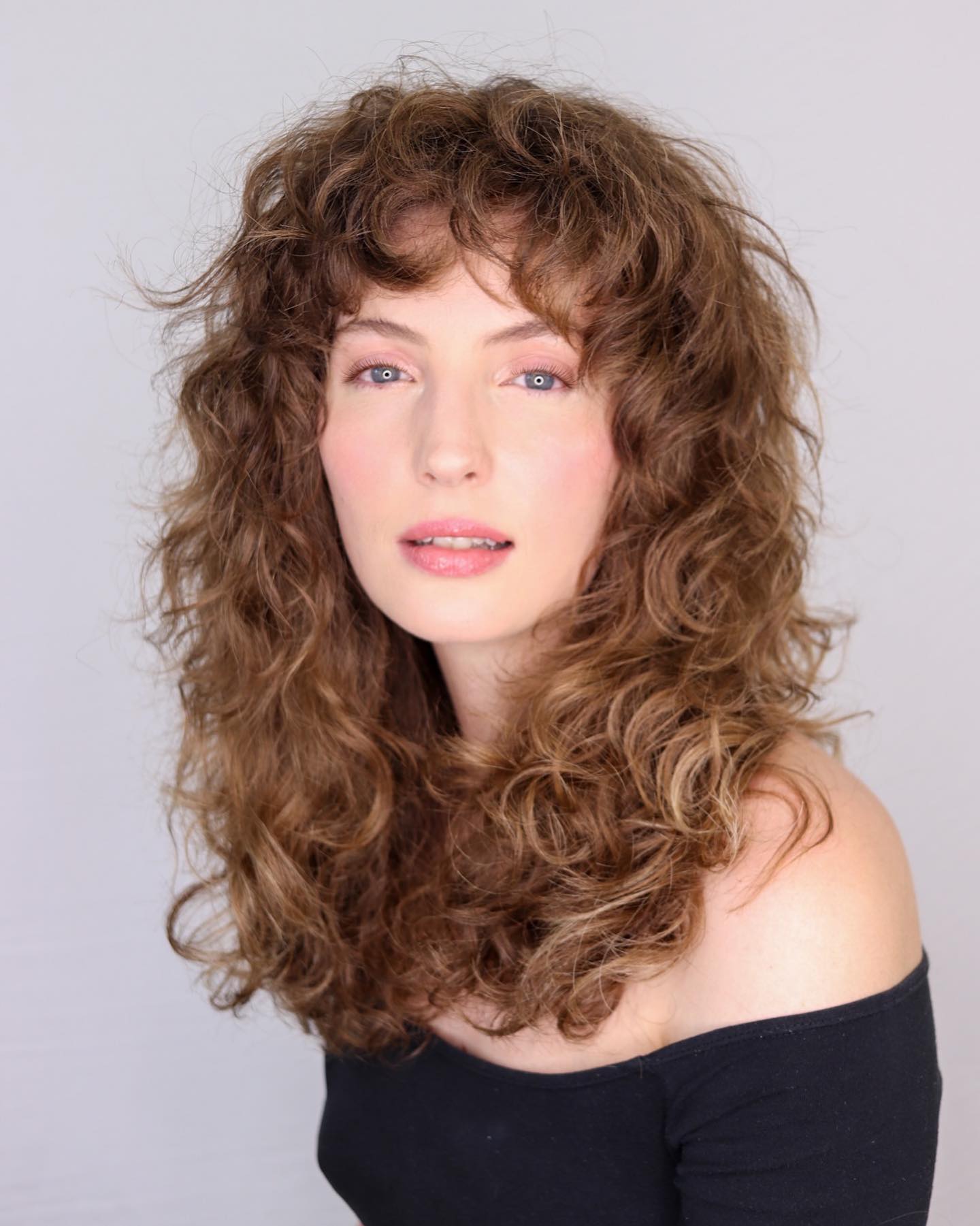 Long Cut with Short Bangs Curly Hair